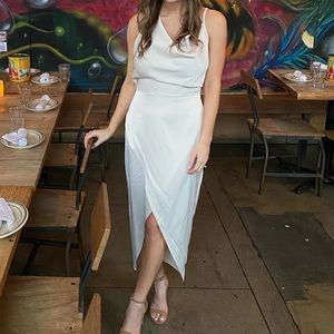 Cream, asymmetric dress, perfect for a bridal shower or rehearsal dinner!